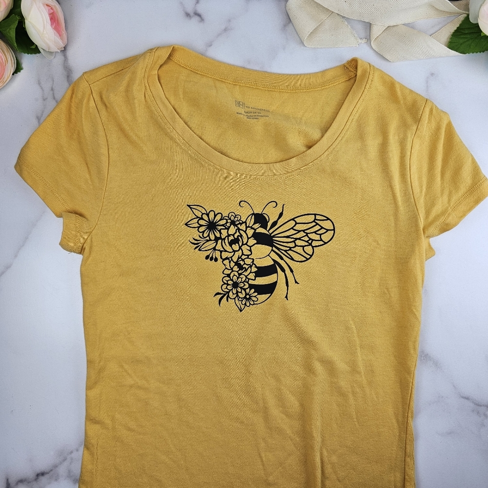 Women's size Small, cap sleeve Tee shirt. Yellow